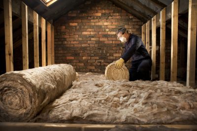 man insulating loft space